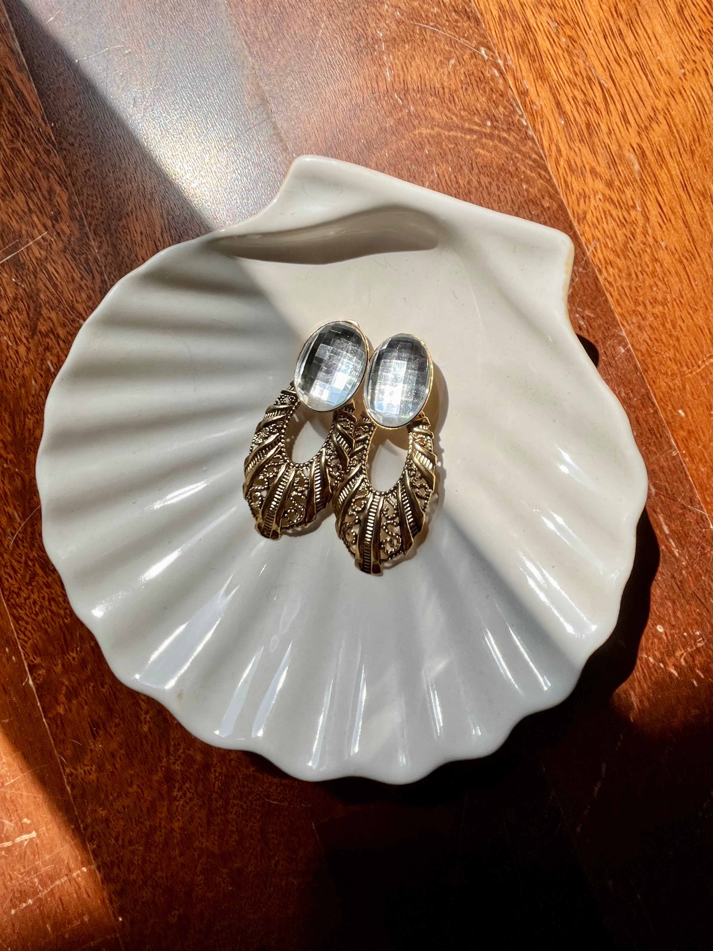 Boucles d'oreilles clip Vénus avec point lumineux