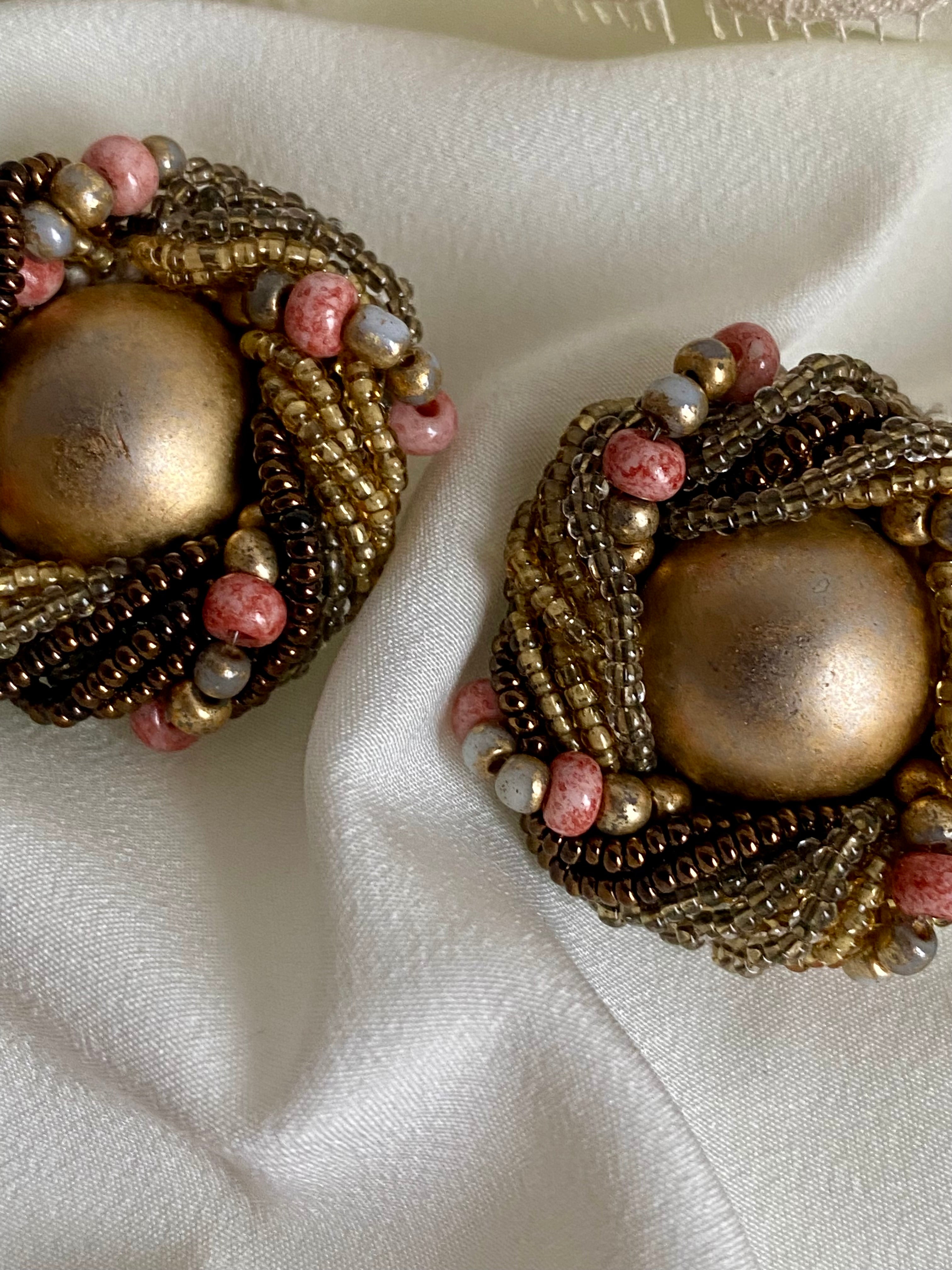 Orecchini a bottone antichi