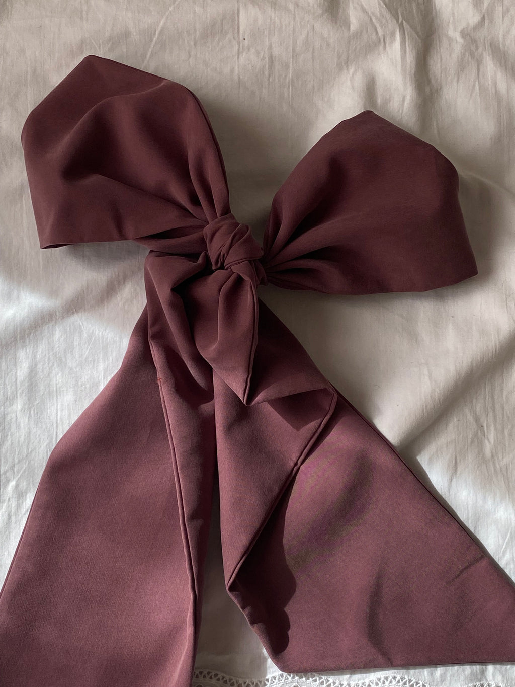 Fiocco sartoriale viola