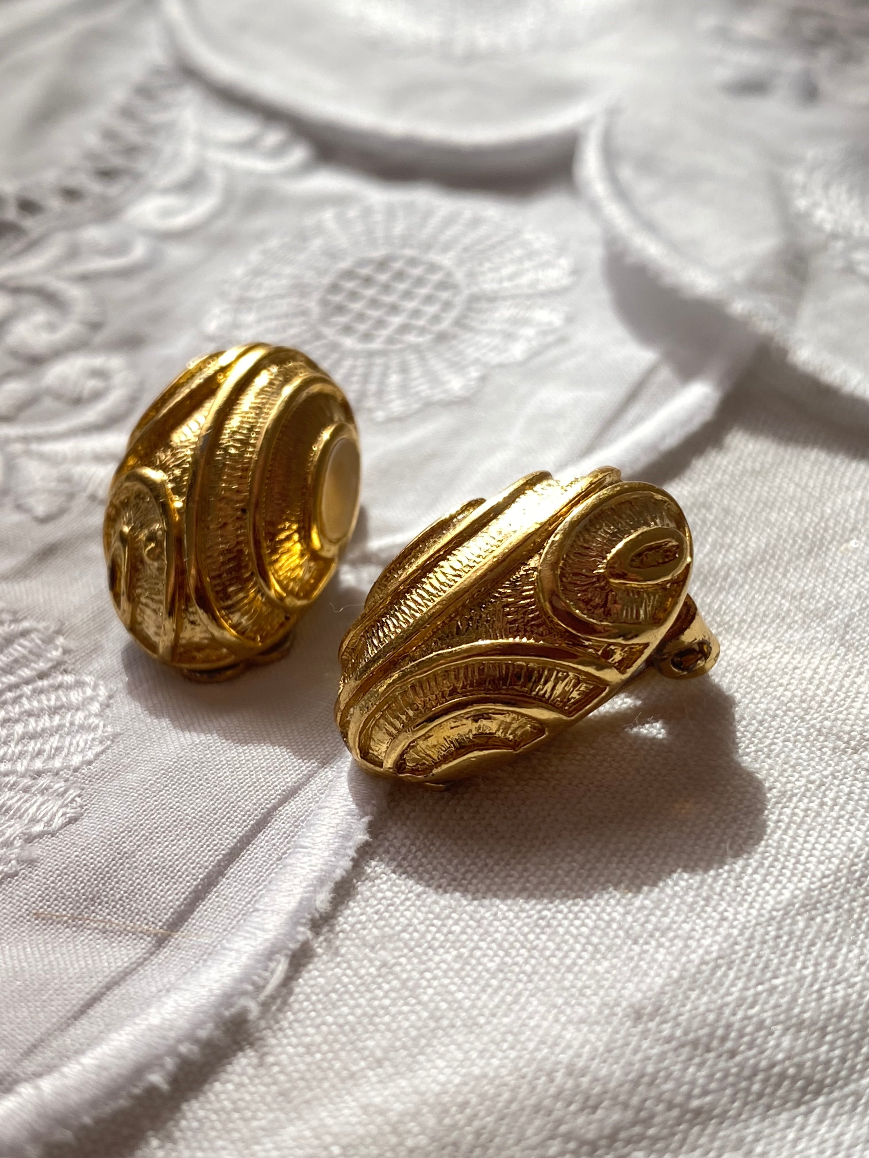 Orecchini a clip a bottone