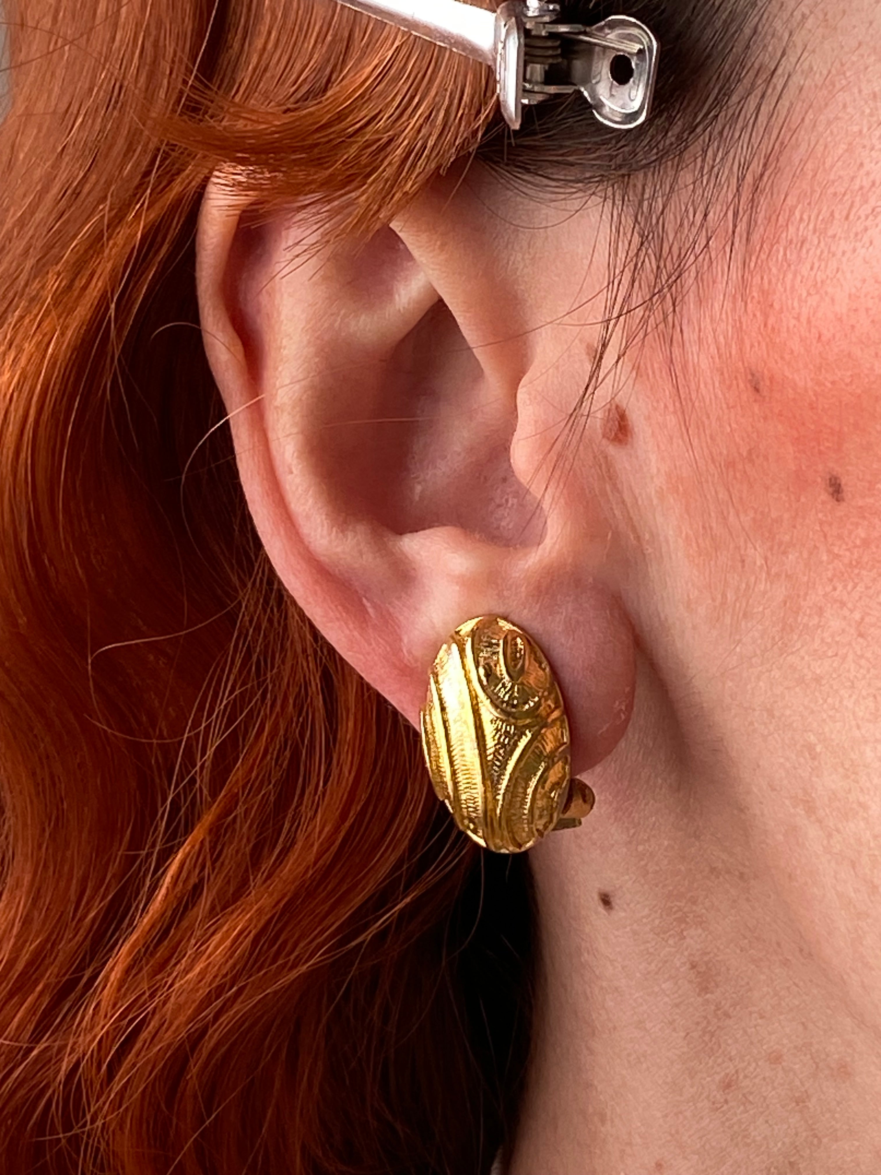 Orecchini a clip a bottone