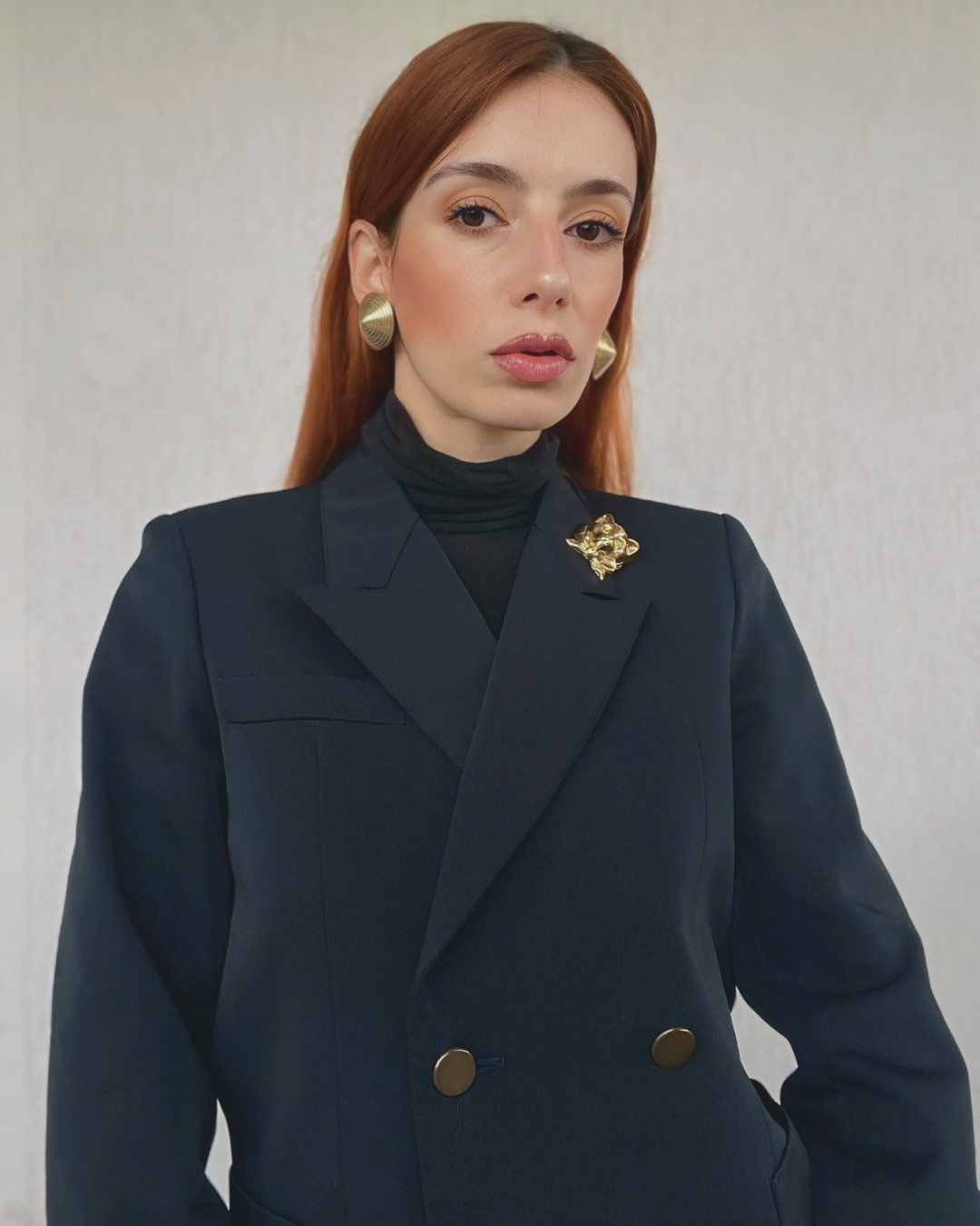 Blazer doppiopetto blu e revers a punta di lancia