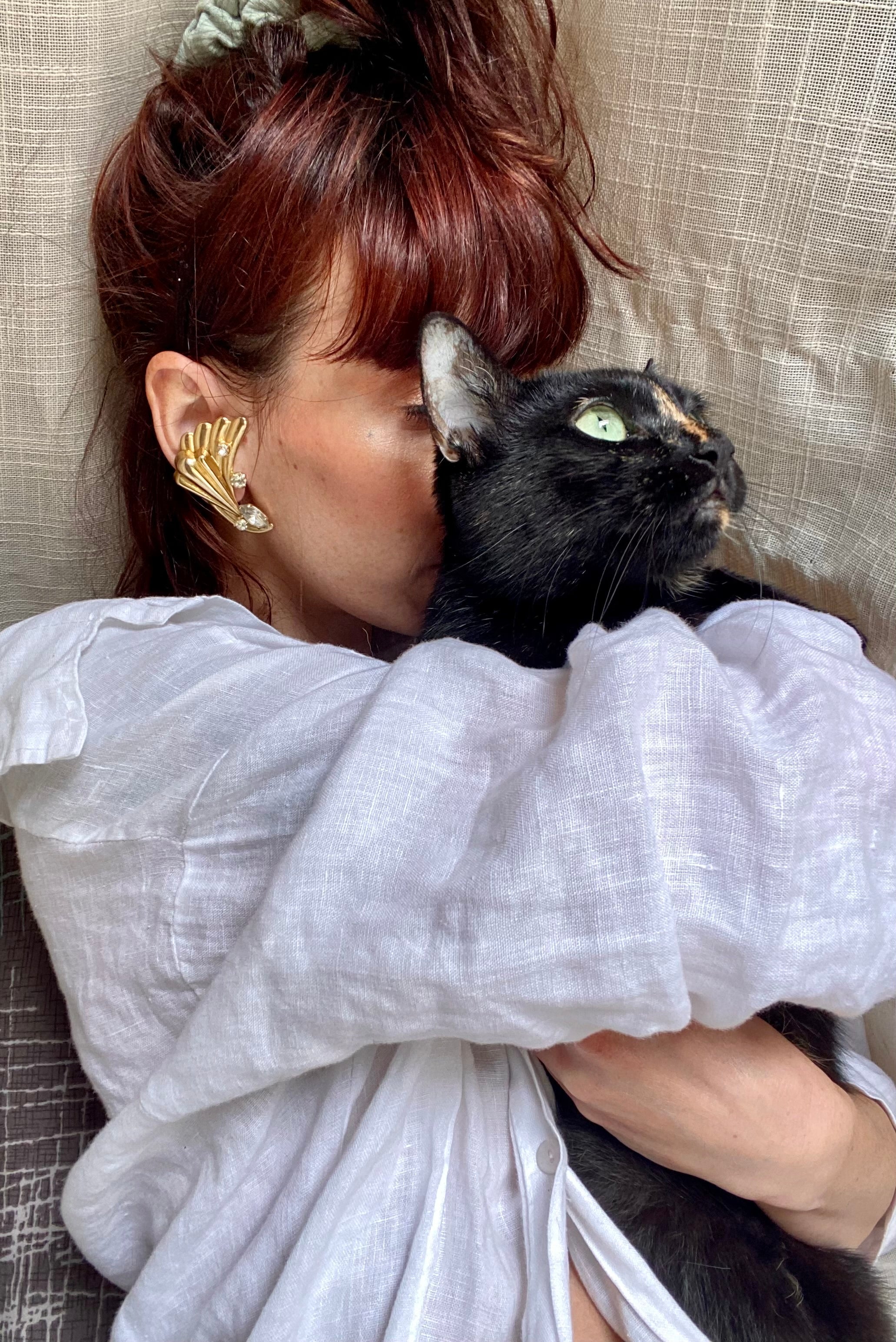 Ali orecchini con punto luce