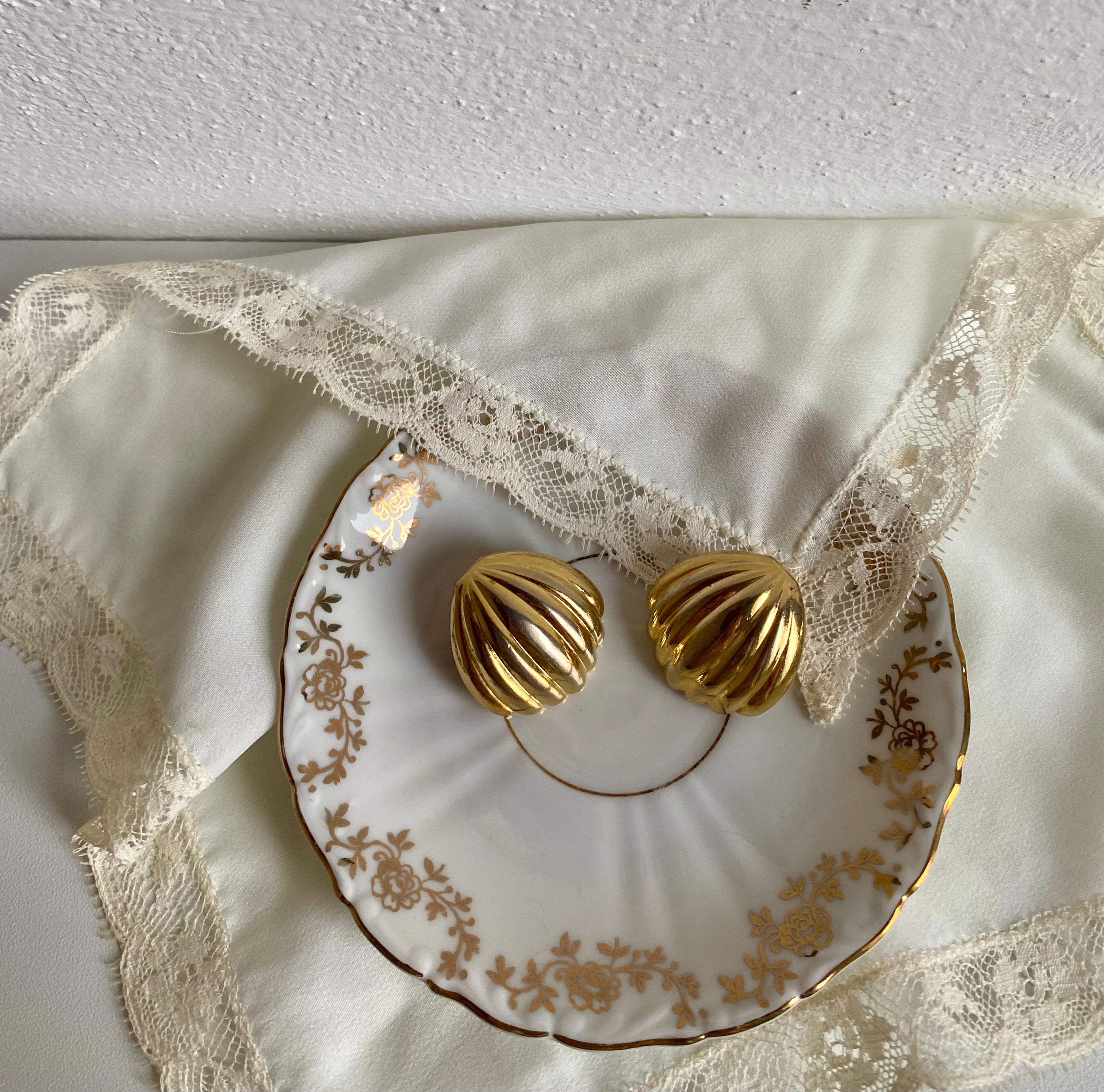 Malfi orecchini a clip a conchiglia