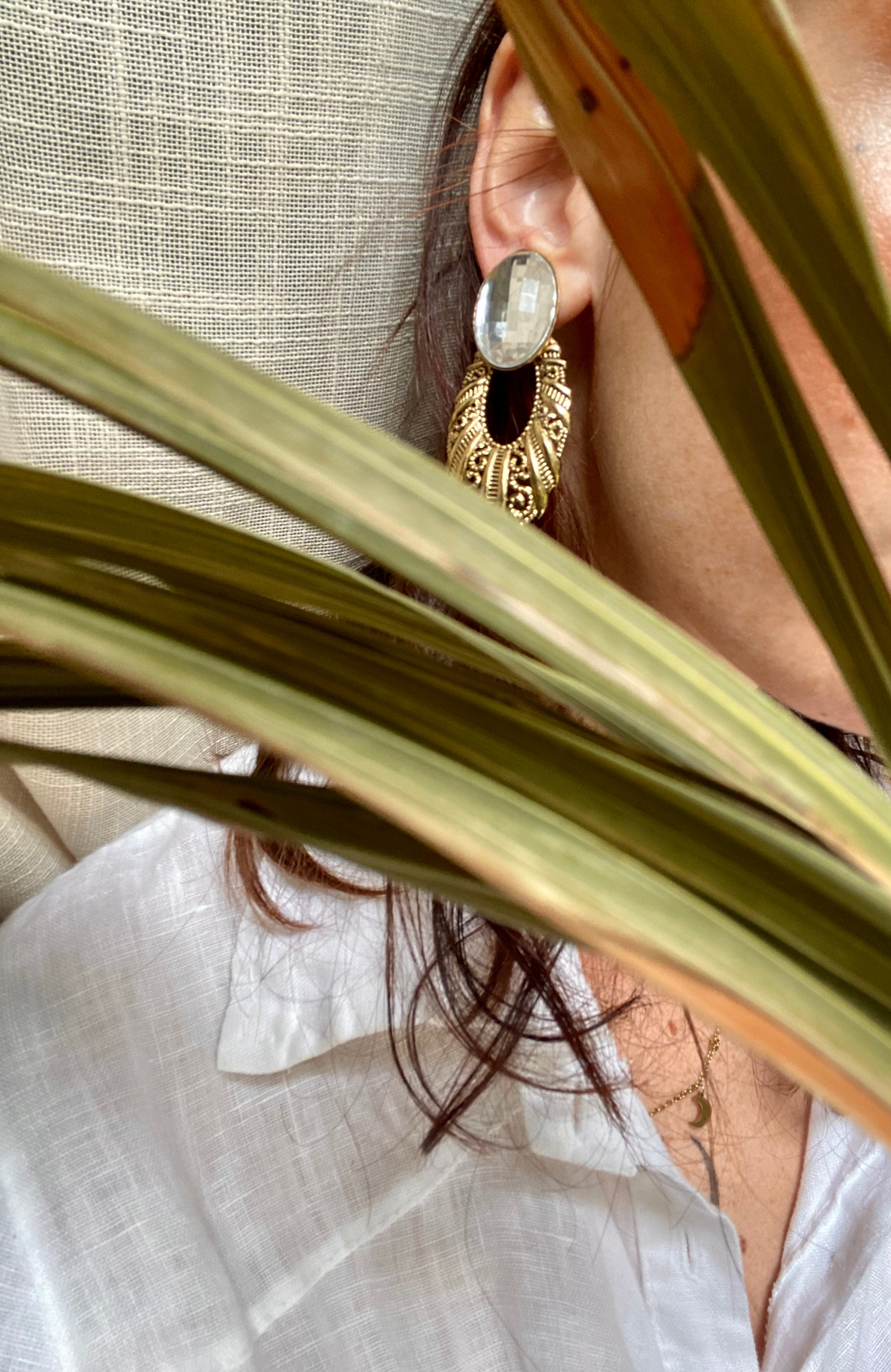 Boucles d'oreilles clip Vénus avec point lumineux