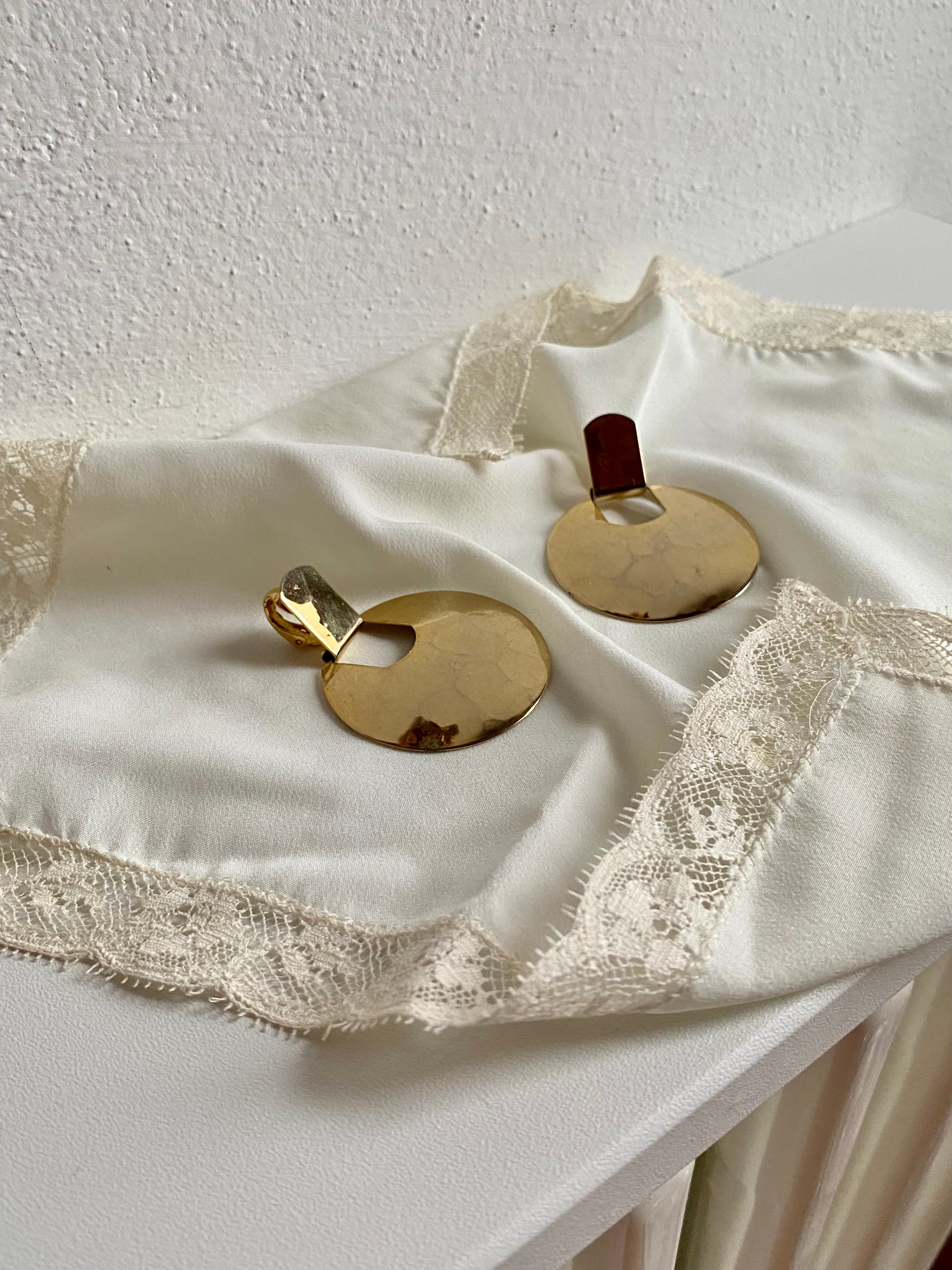 Specchio orecchini rotondi