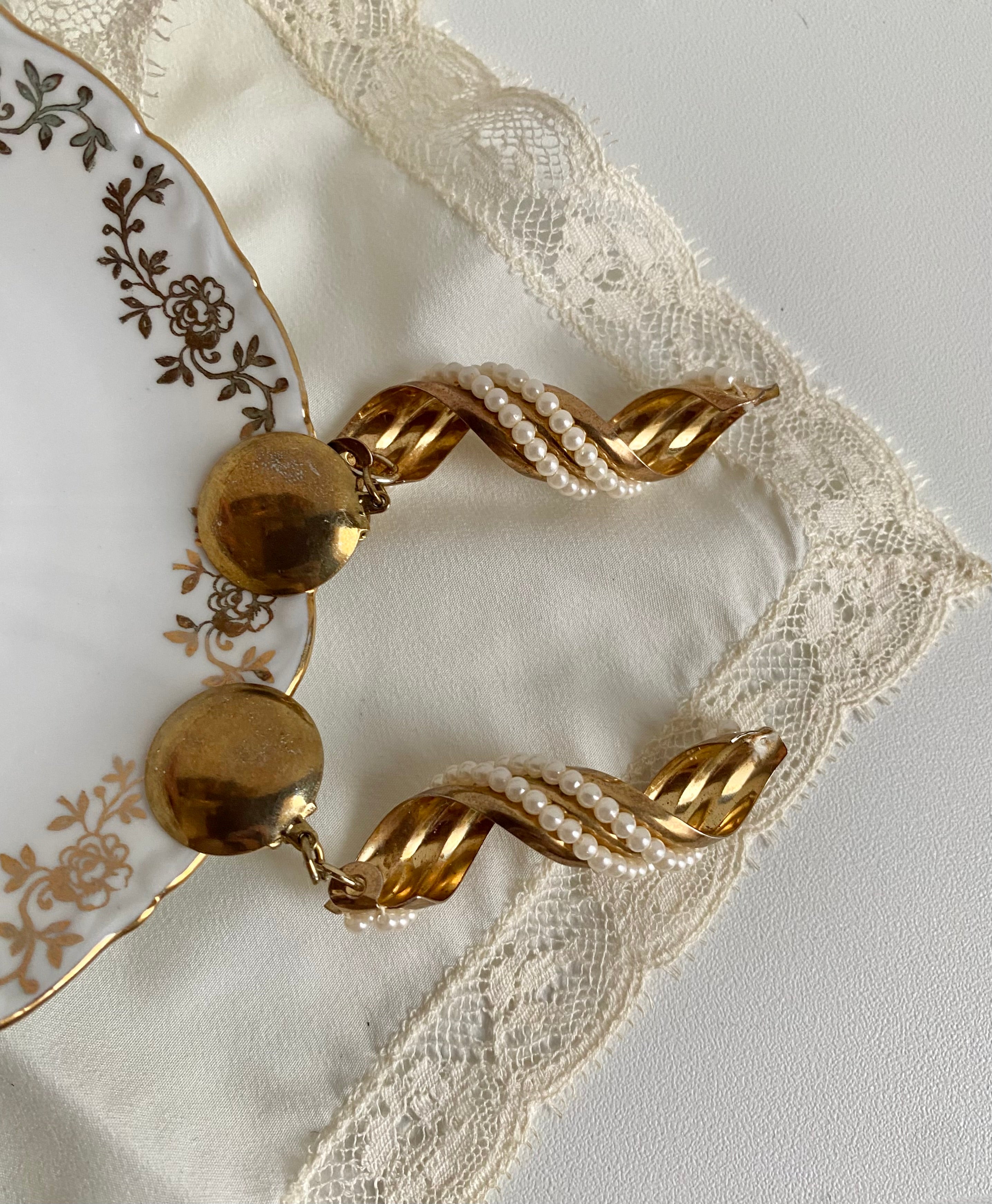 Onda orecchini a clip