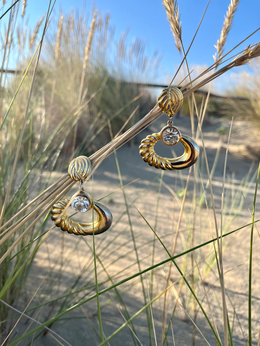 Luce orecchini pendenti maxi