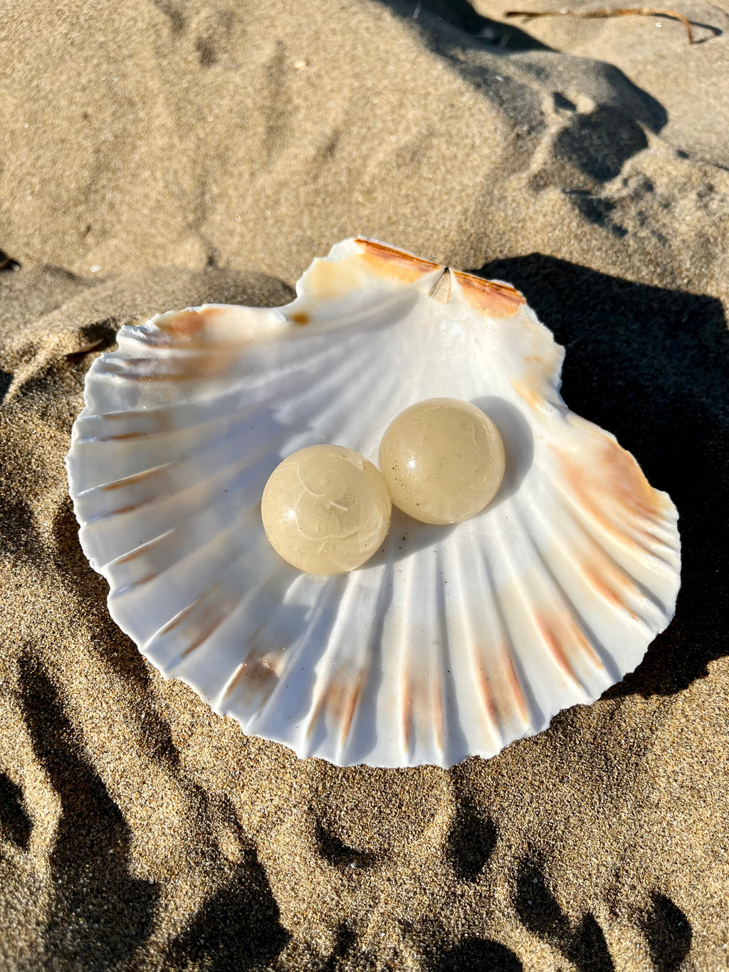 Orecchini in perla a bottone
