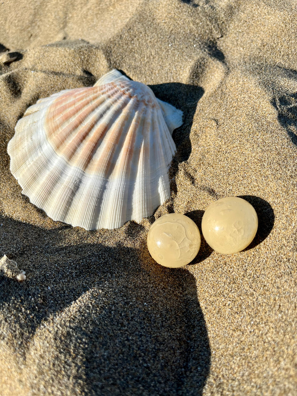 Orecchini in perla a bottone