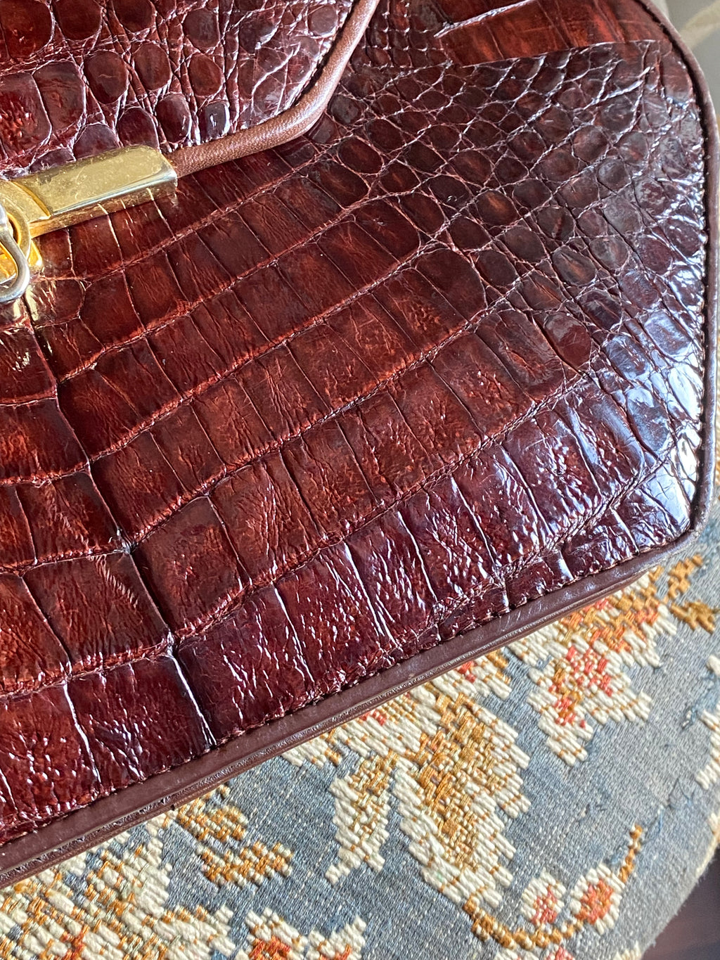Pochette coccodrillo rombo