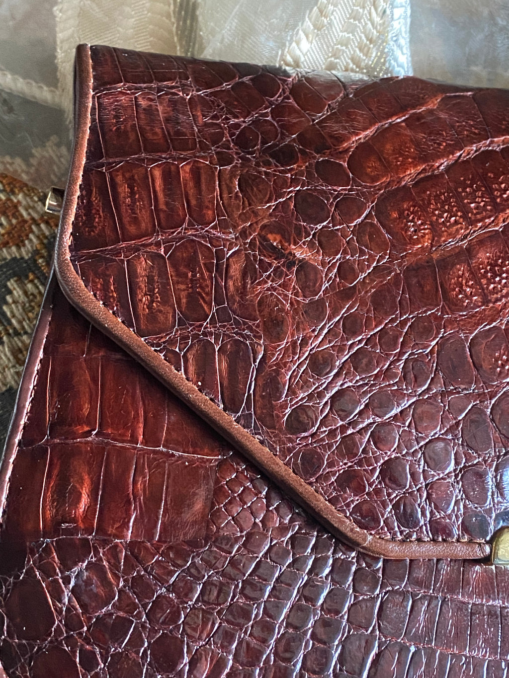 Pochette coccodrillo rombo