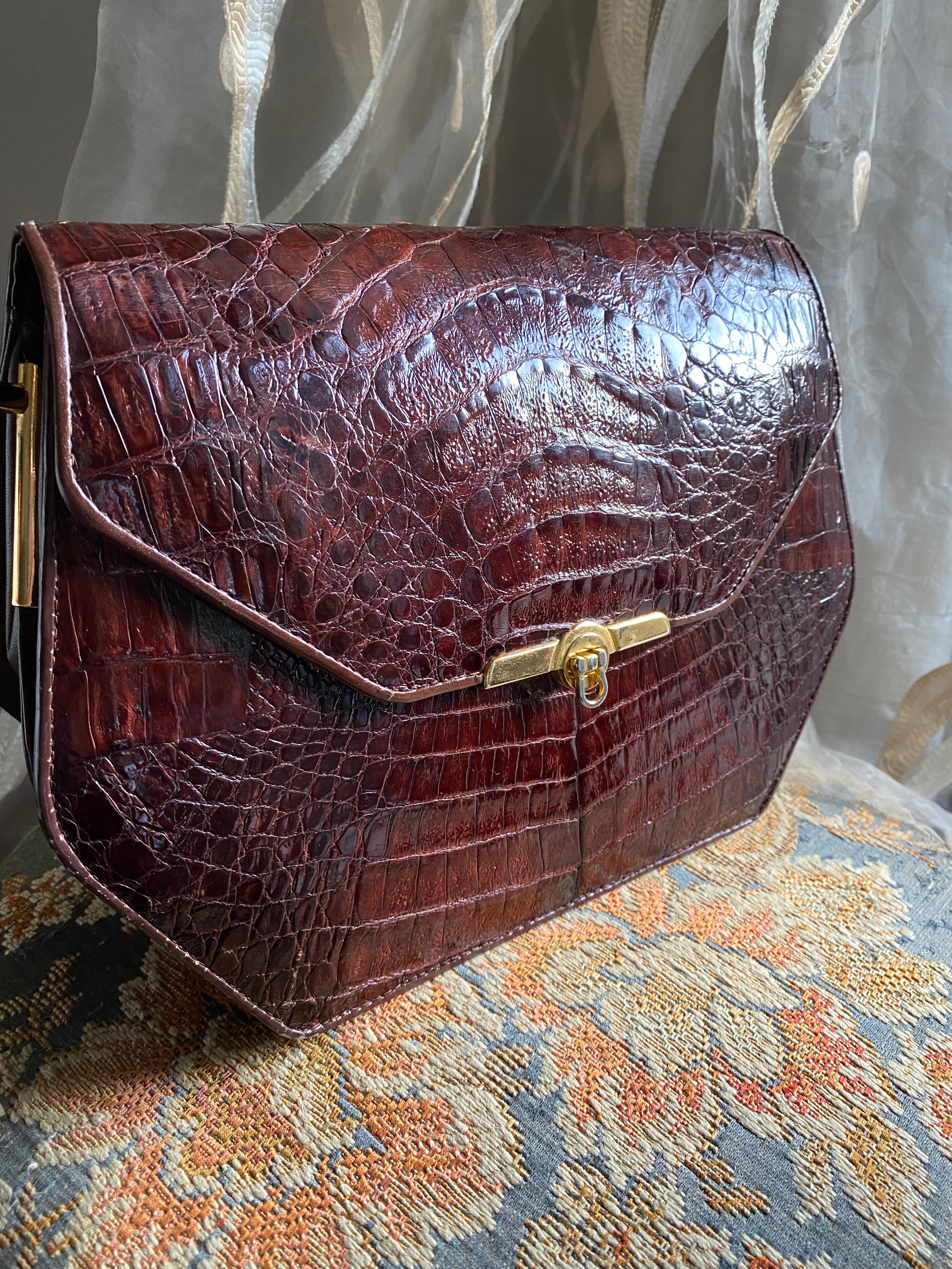 Pochette coccodrillo rombo