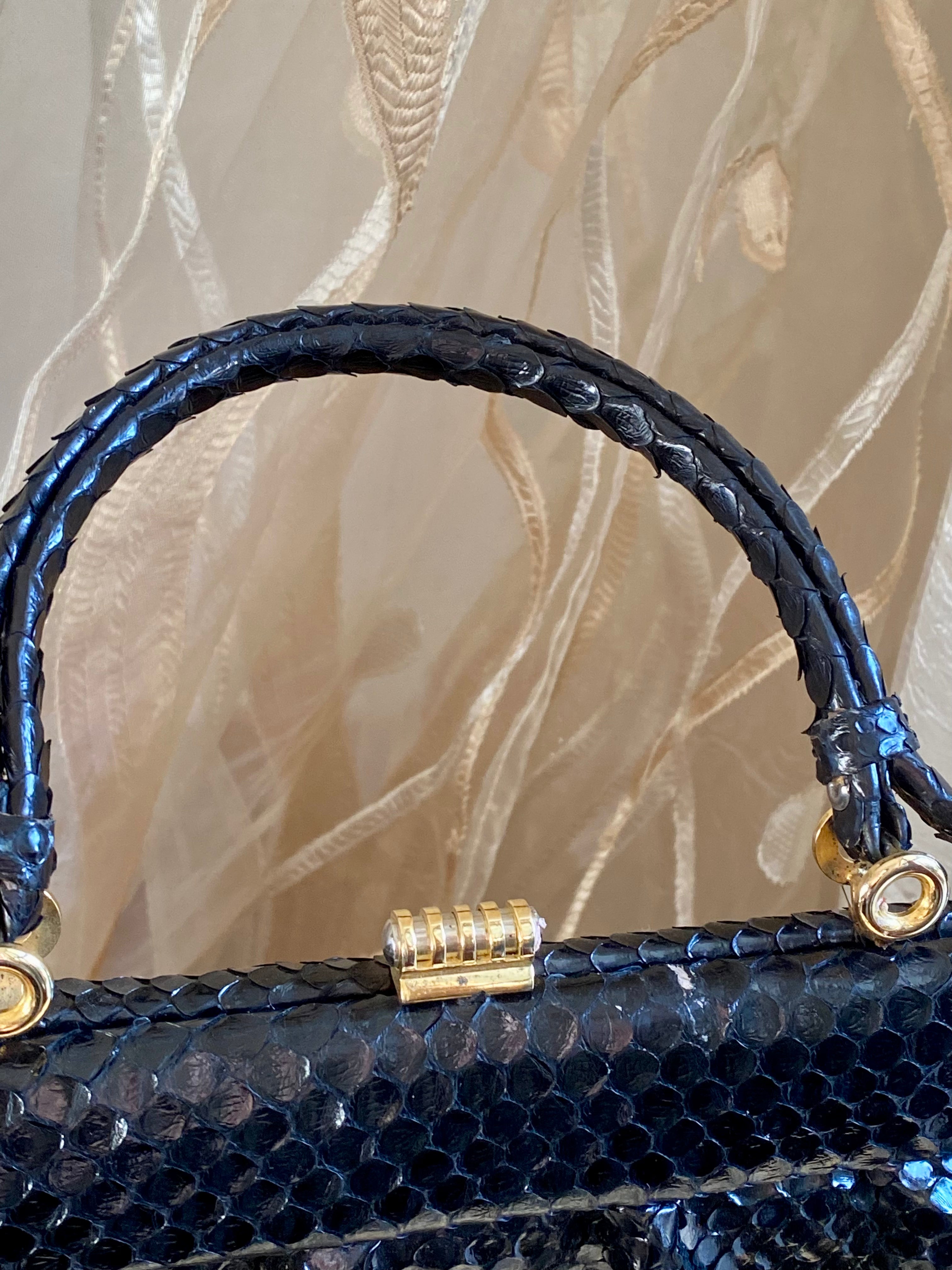 Mini borsetta a mano coccodrillo