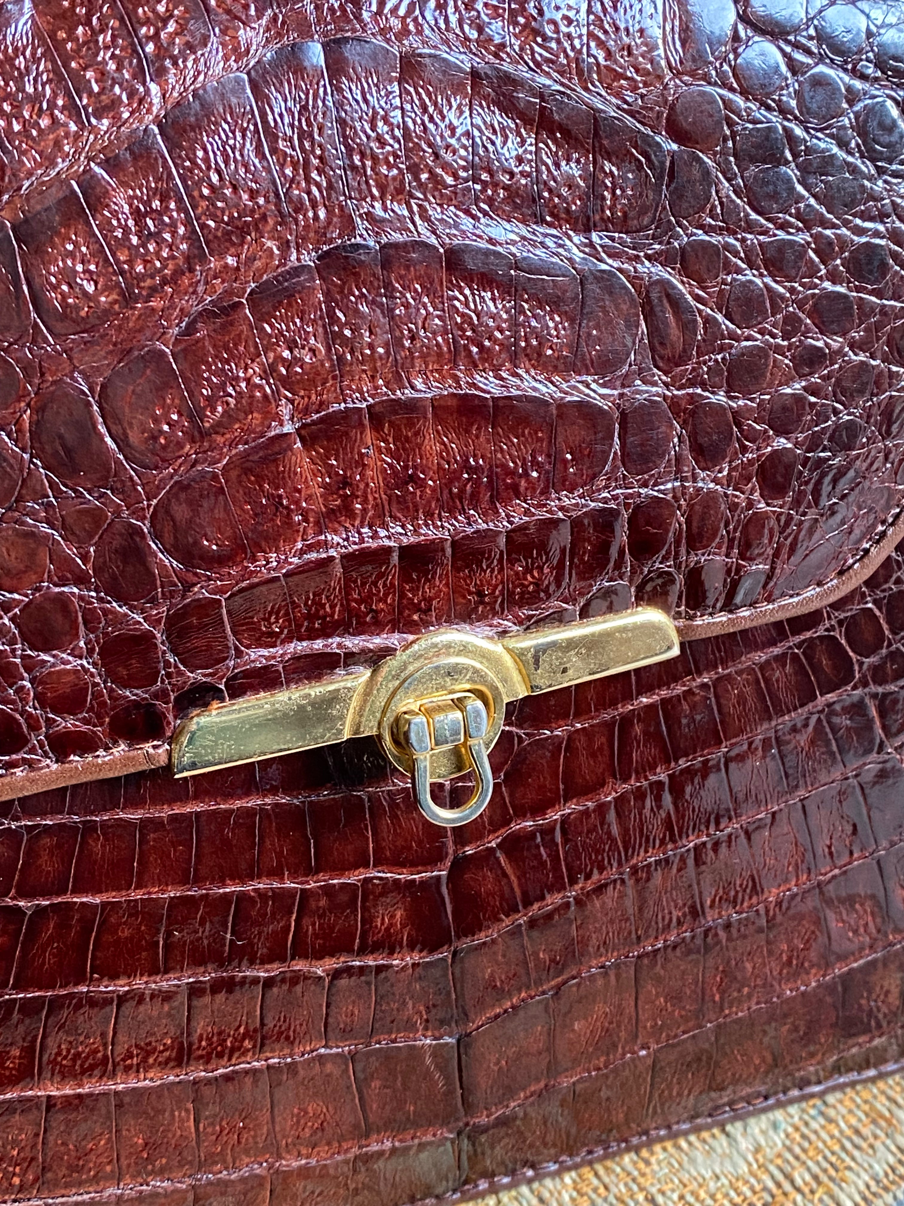 Pochette coccodrillo rombo