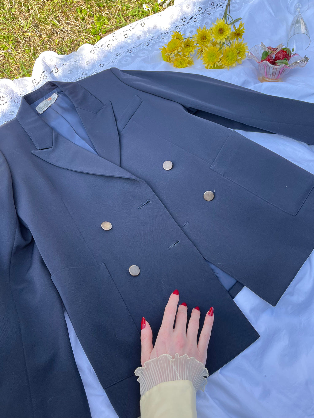 Blazer doppiopetto blu e revers a punta di lancia