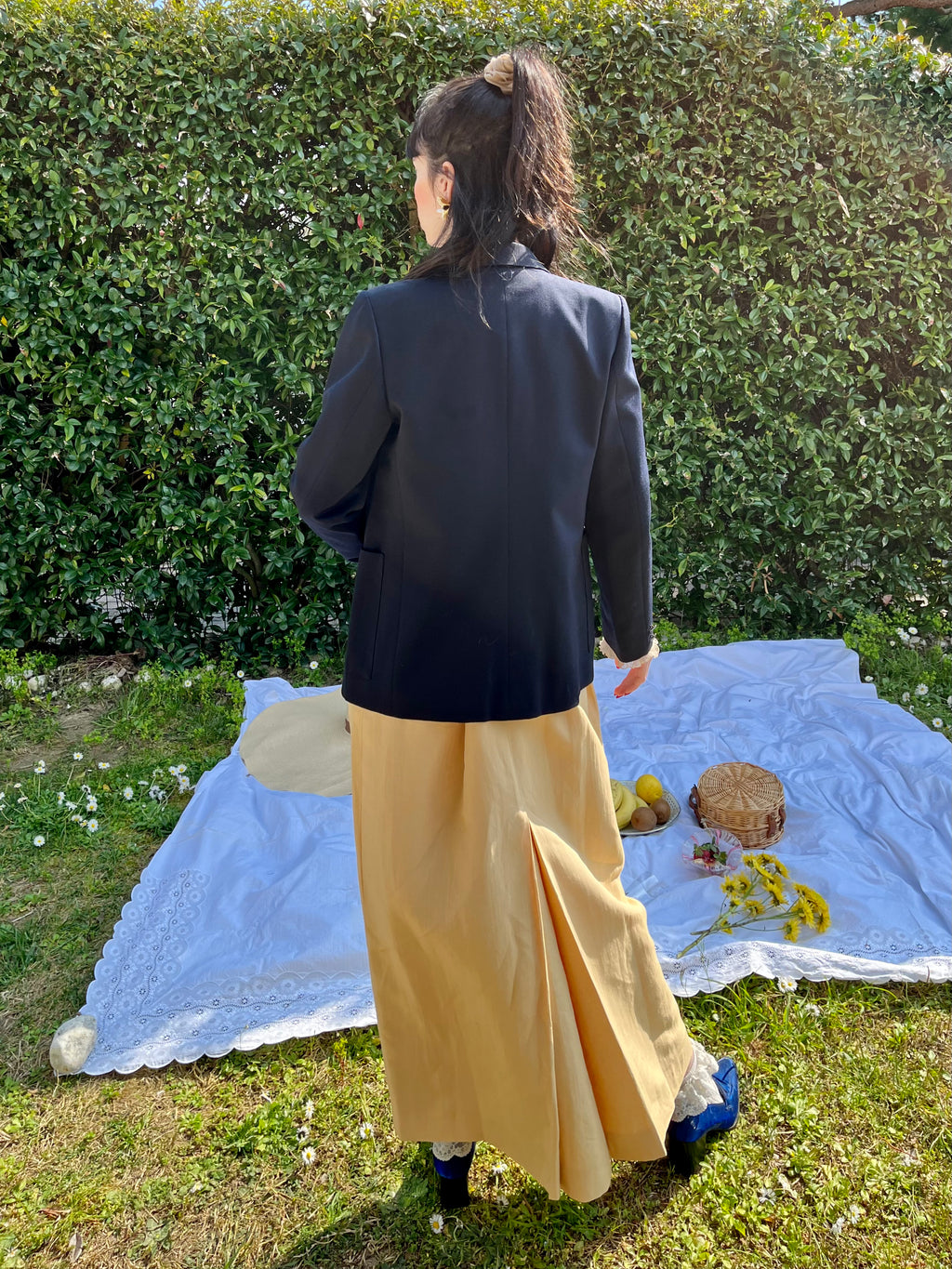 Blazer doppiopetto blu e revers a punta di lancia