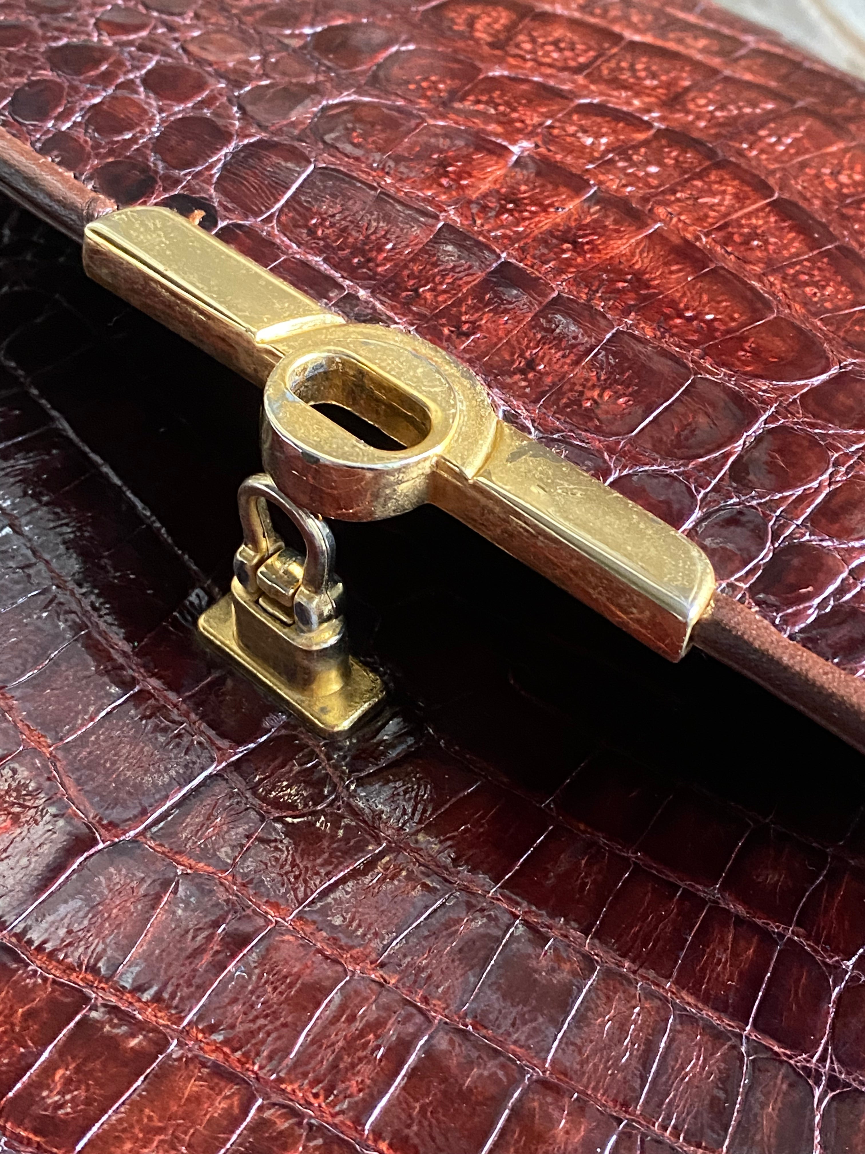 Pochette coccodrillo rombo