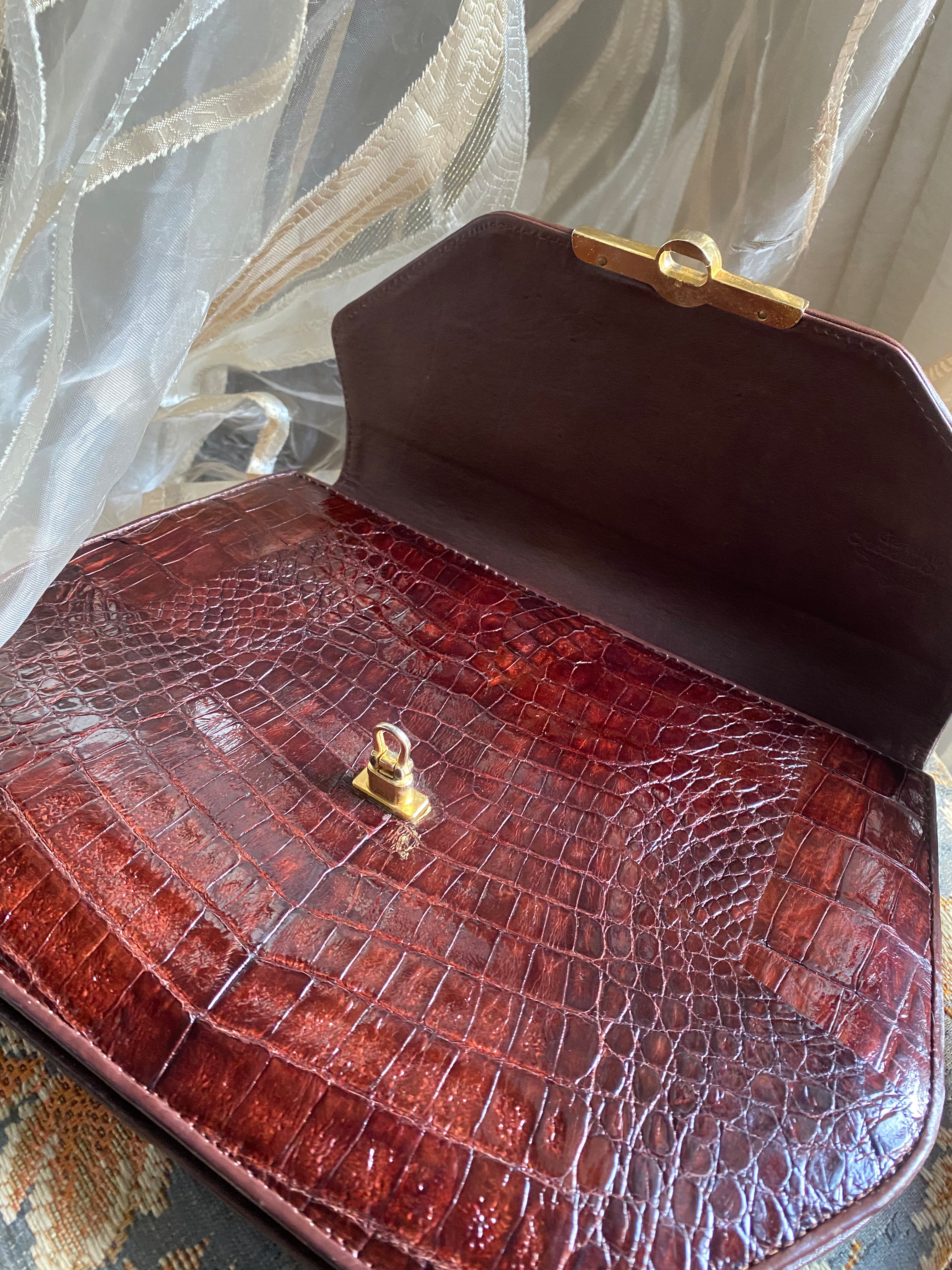 Pochette coccodrillo rombo