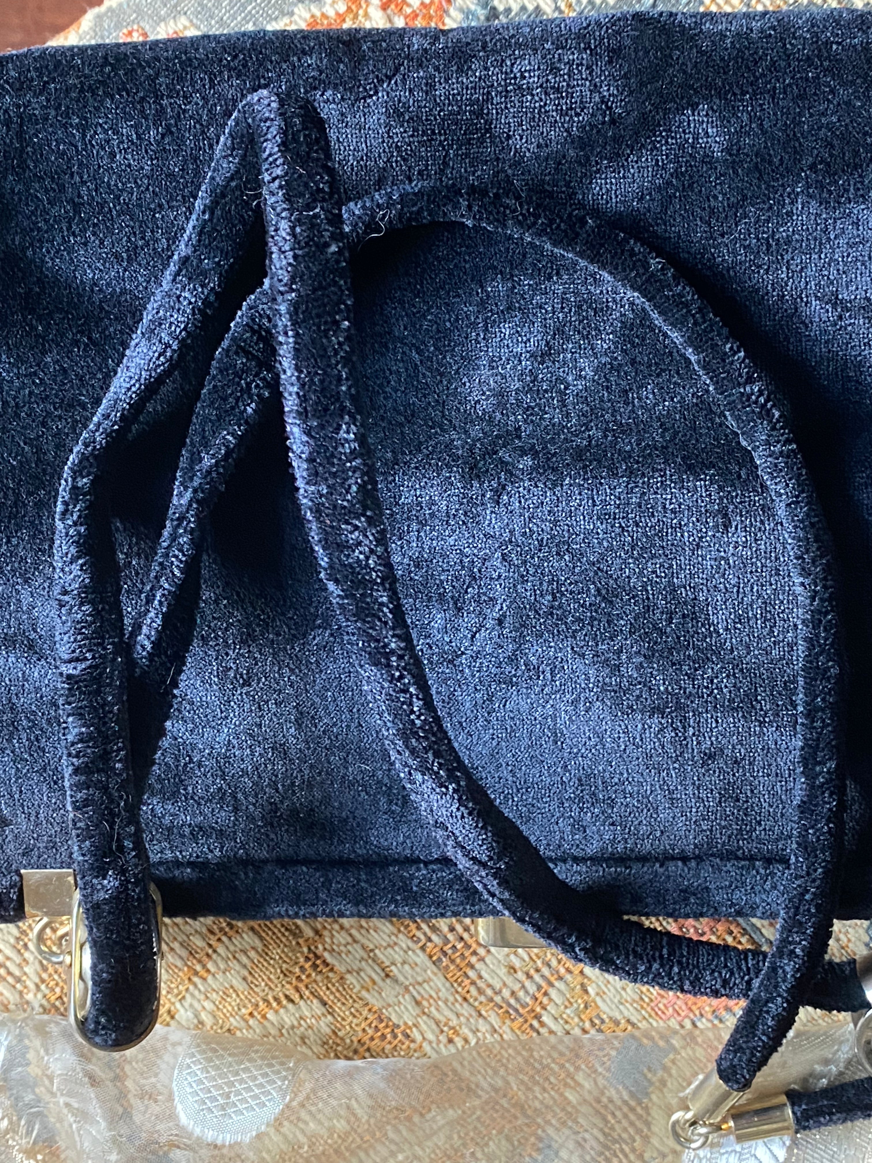 Borsetta in velluto asimmetrica