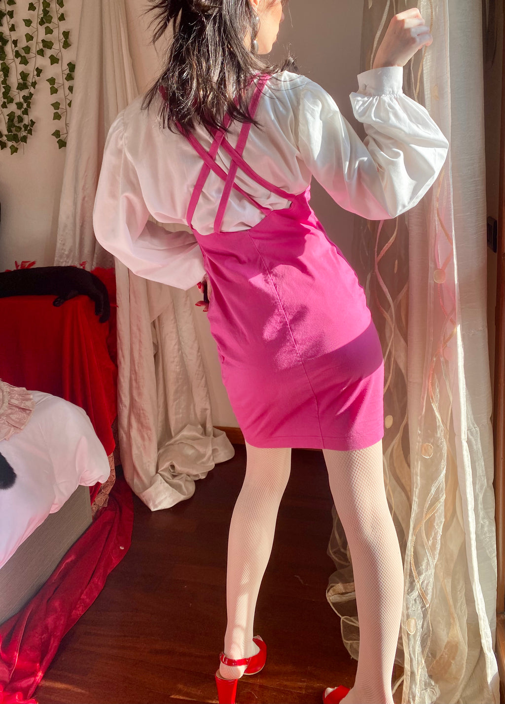 Vestitino rosa con spalline invertite