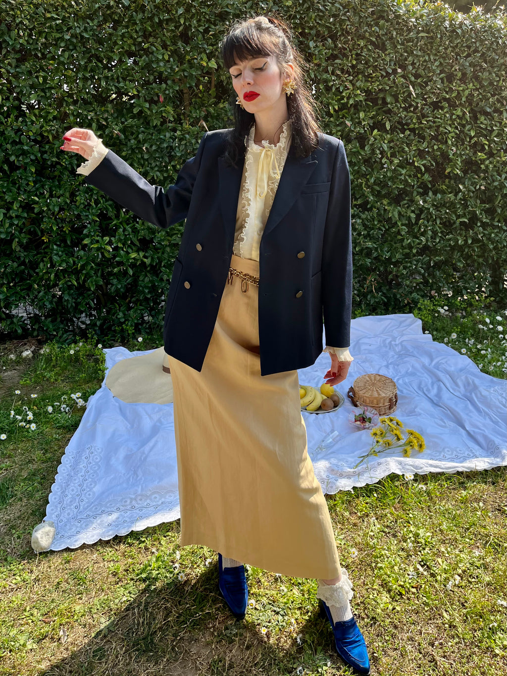 Blazer doppiopetto blu e revers a punta di lancia