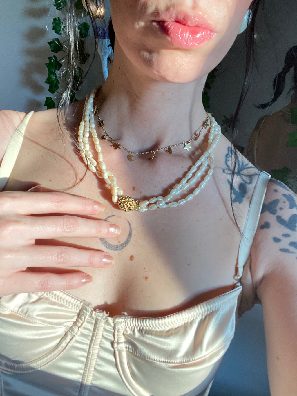 Collana in perle tre fili con chiusura in oro