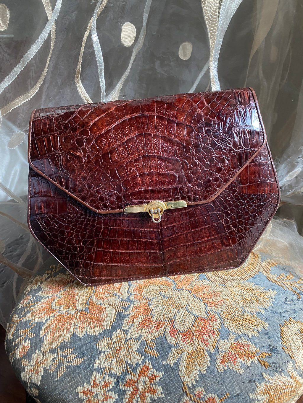Pochette coccodrillo rombo