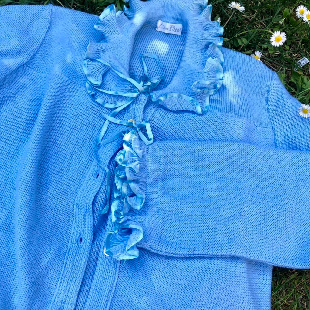 Cardigan pastello con colletto e polsini arricciati