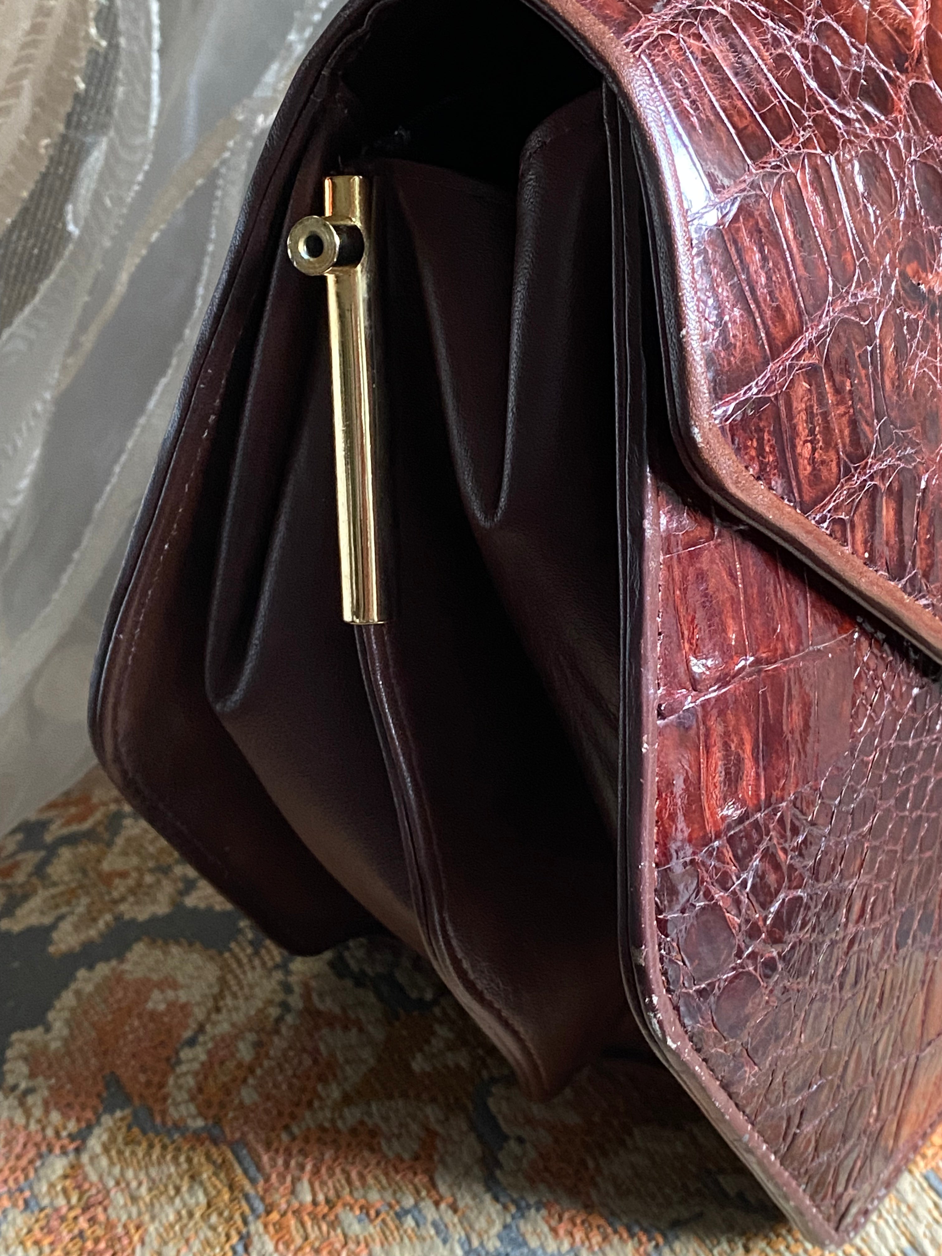 Pochette coccodrillo rombo